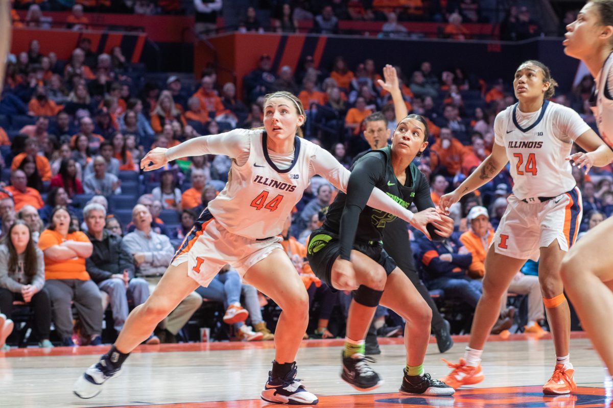 Senior+forward+Kendall+Bostic+putting+herself+in+front+of+the+ball+following+a+Michigan+State+free+throw+on+Jan.+29.+Illinois+is+ranked+No.+23+in+the+Associated+Press+preseason+poll.
