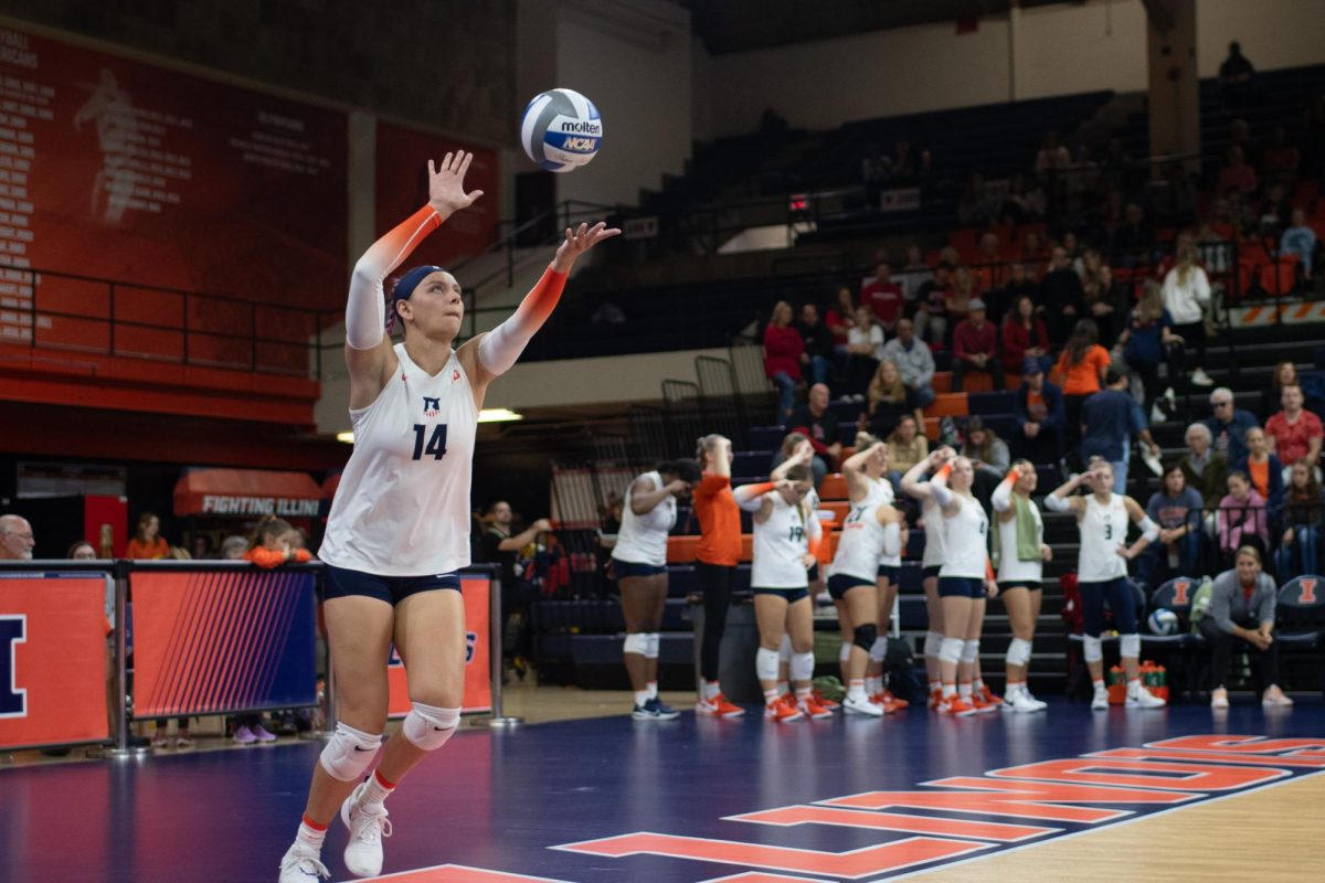 Outside Hitter Jessica Nunge prepares to serve during the fourth set against Rutgers on Oct. 15.