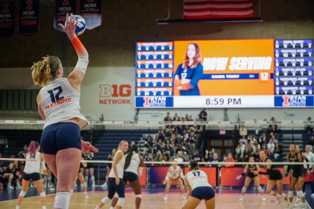 Senior outside hitter Raina Terry serves the ball during second set on Wednesday against the Northwestern Wildcats. Terry led the Illini with 22 kills.