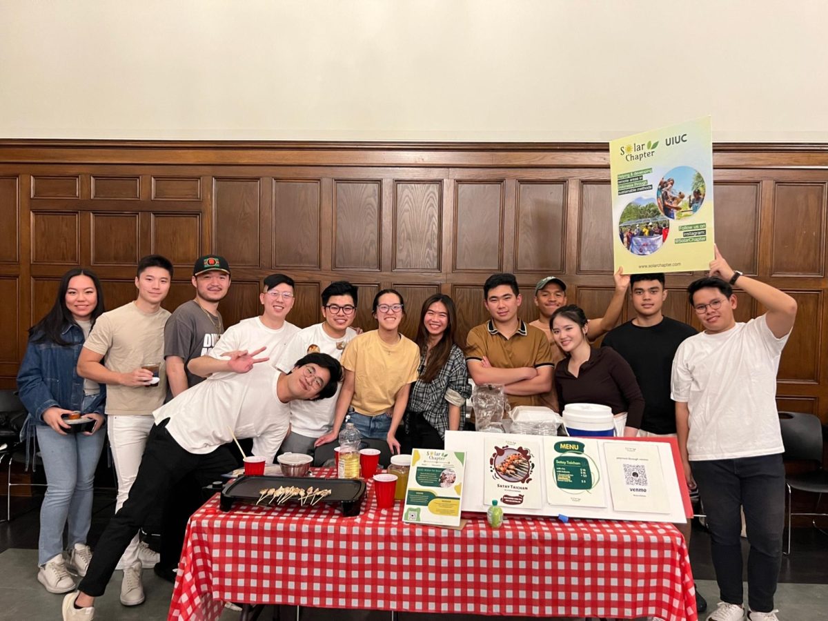 Indonesian Student Association members gather around a table in the University YMCA during last years traditional night market on Nov. 5, 2022.