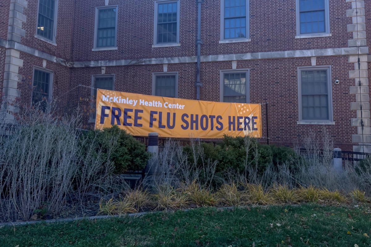 Banner Free Fku Shots Here hangs at McKinley Health Center. 