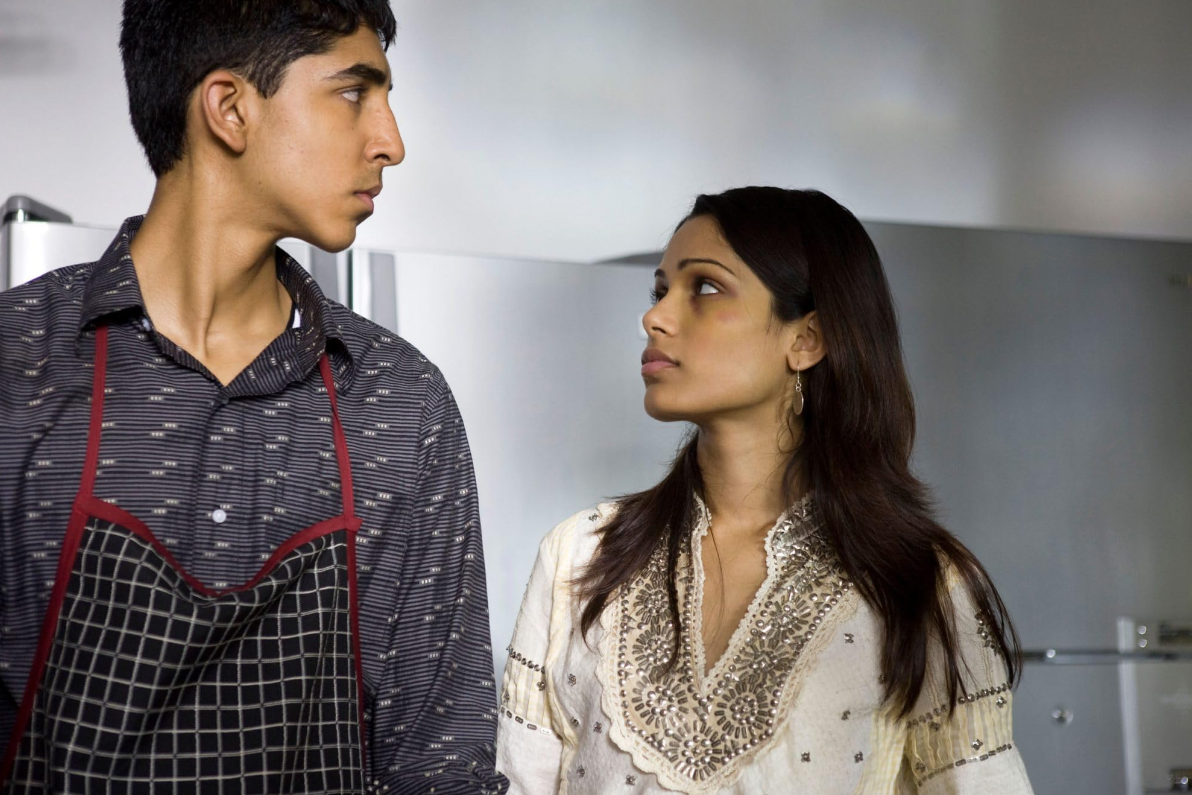 Dev Patel and Freida Pinto in 2008 Danny Boyle romance indie film, Slumdog Millionaire.