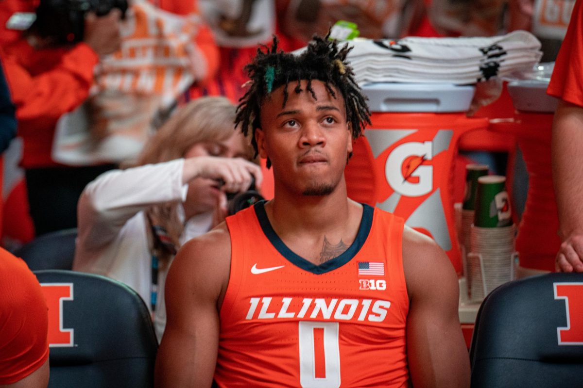 Terrence Shannon sits on the bench before the Nov. 14 game vs. Marquette. Shannon was suspended from Illinois basketball on Thursday after being charged with rape.