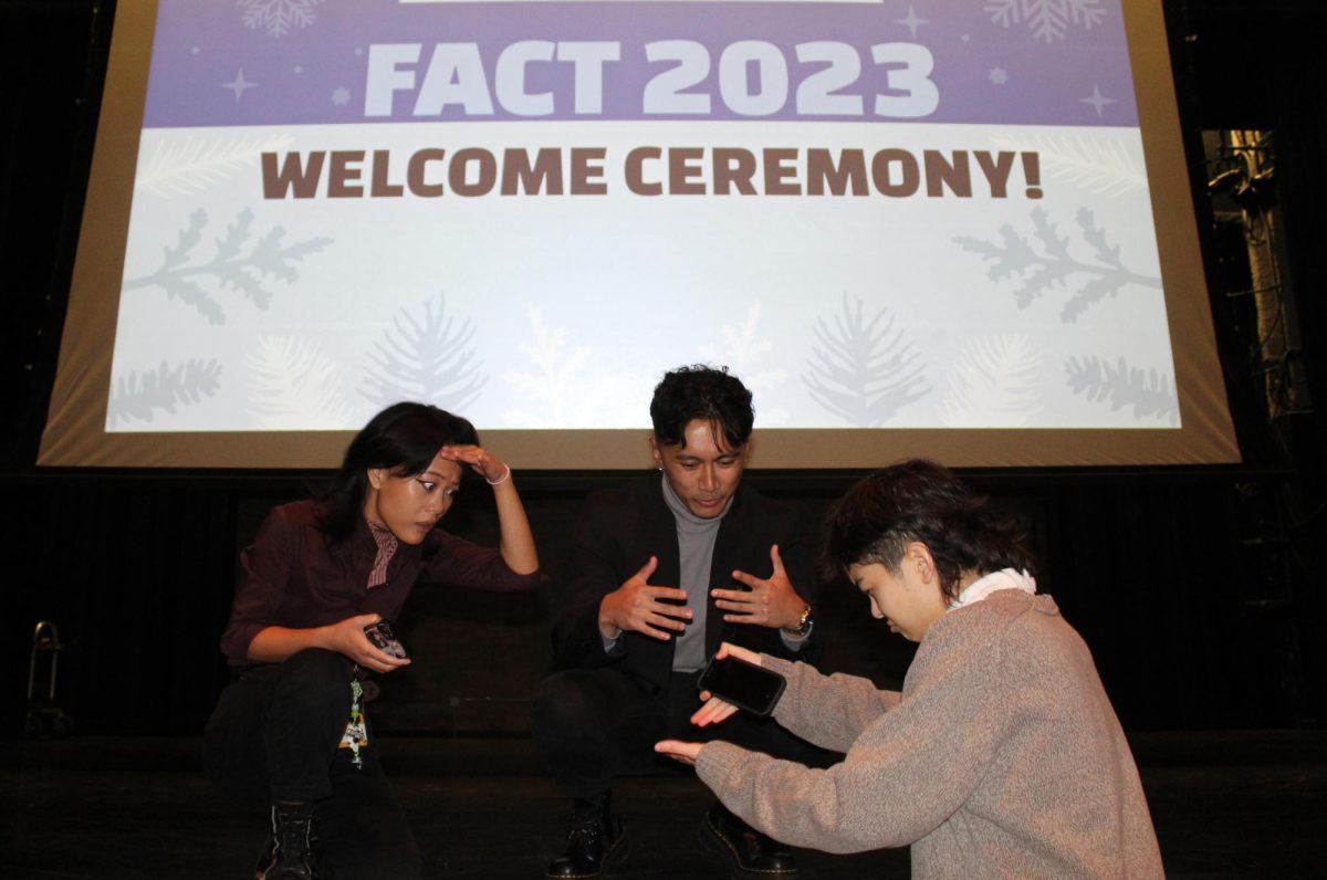 (Left to right) Filipino Americans Coming Together coordinators Jamie Bernal, Matthew Panopio and Philippine Student Association president Alyssa Daniels during the FACT 2023 conference welcome ceremony on Dec. 1.