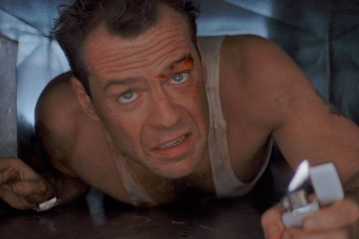 Bruce Willis as John McClane crawls through a vent in the 1988 action film Die Hard.
Columnist Nicolas Roacho tackles the question if Die Hard counts as a Christmas movie.