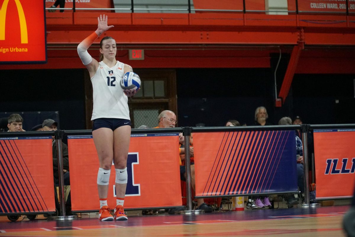 Senior outside hitter Raina Terry serves the ball at the second set against Rutgers on Oct. 15. 