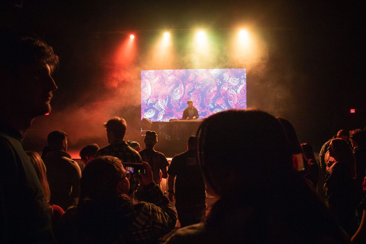 DJ F.O.H. applies stage effects to unite the crowd at Canopy Club on Saturday.