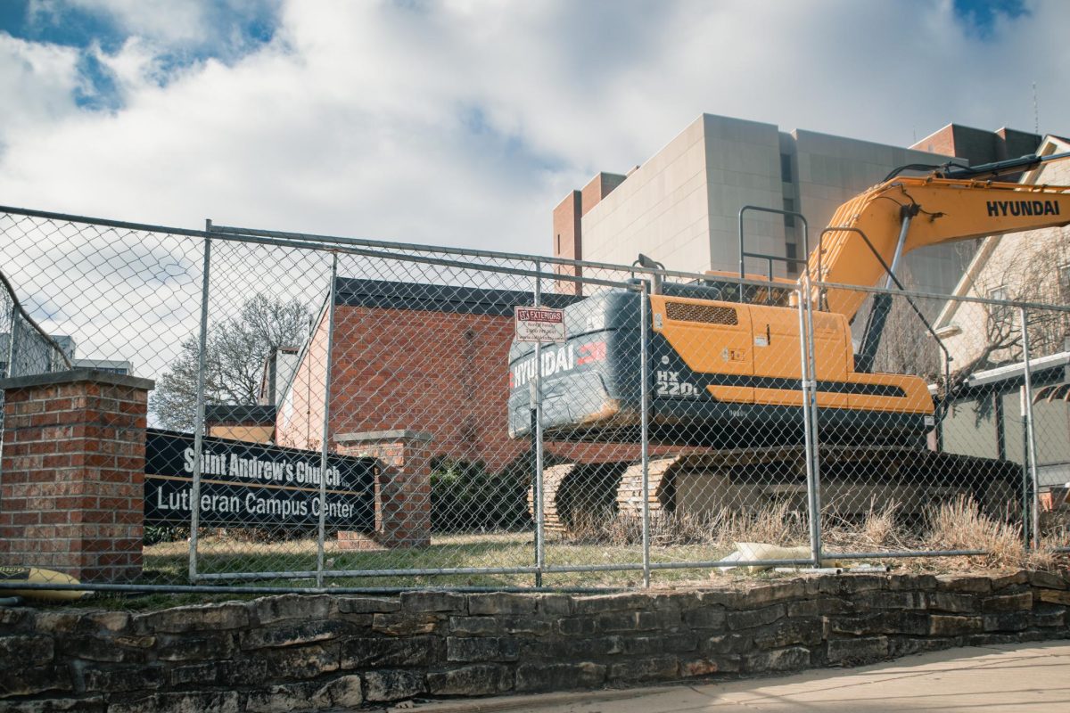An excavator sits outside Saint Andrews Church, between Daniel and Chalmers street on Friday.
