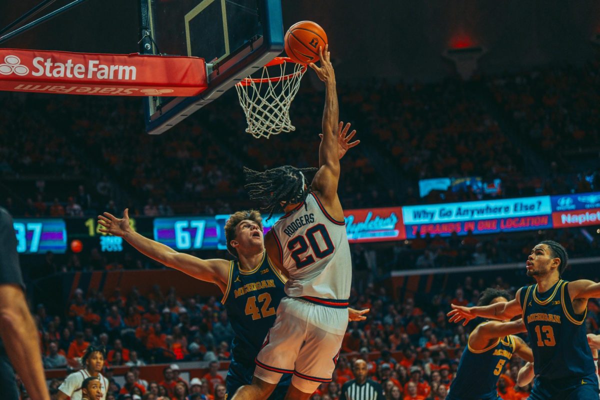 Sophomore Ty Rodgers slam-dunks against Michigan on Tuesday.