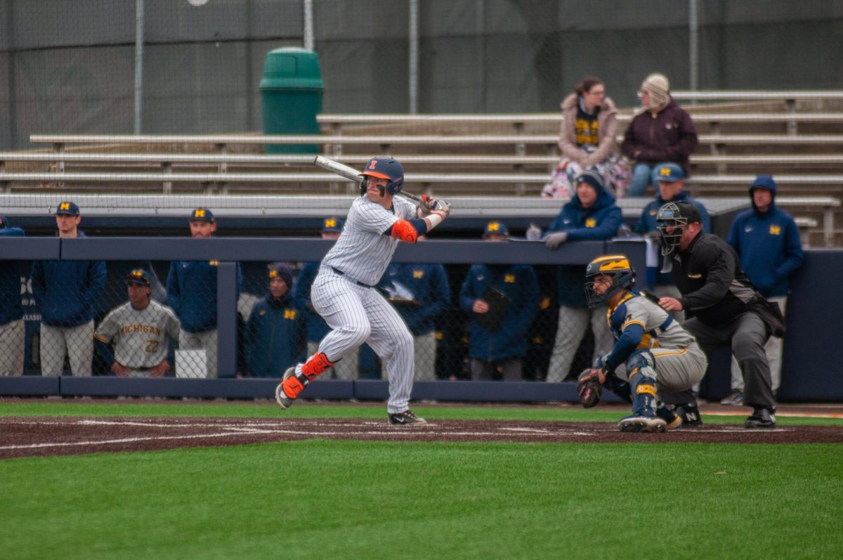 Junior INF Drake Westcott hits the ball during the game against Michigan on Apr. 1. 