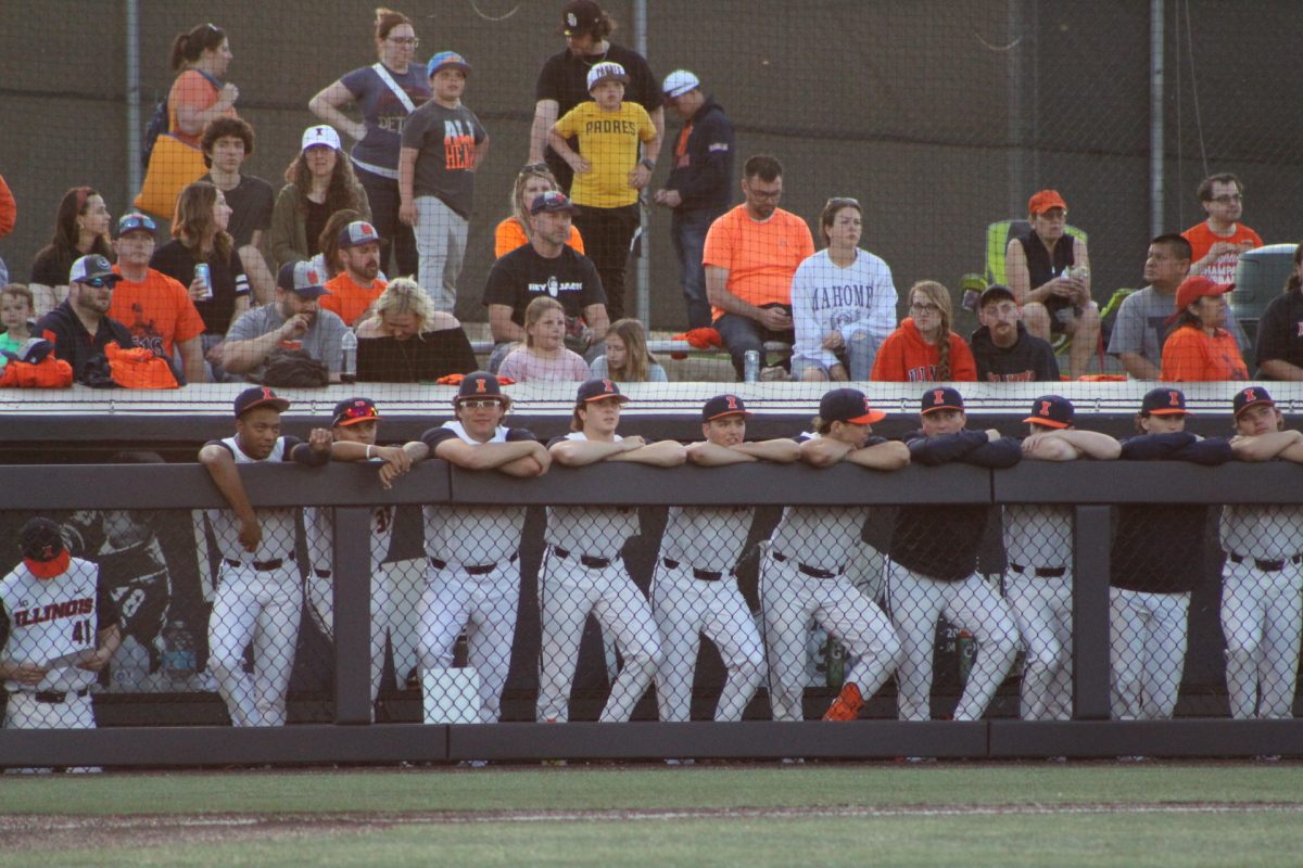 The Illini watch from the dugout on Apr. 14.