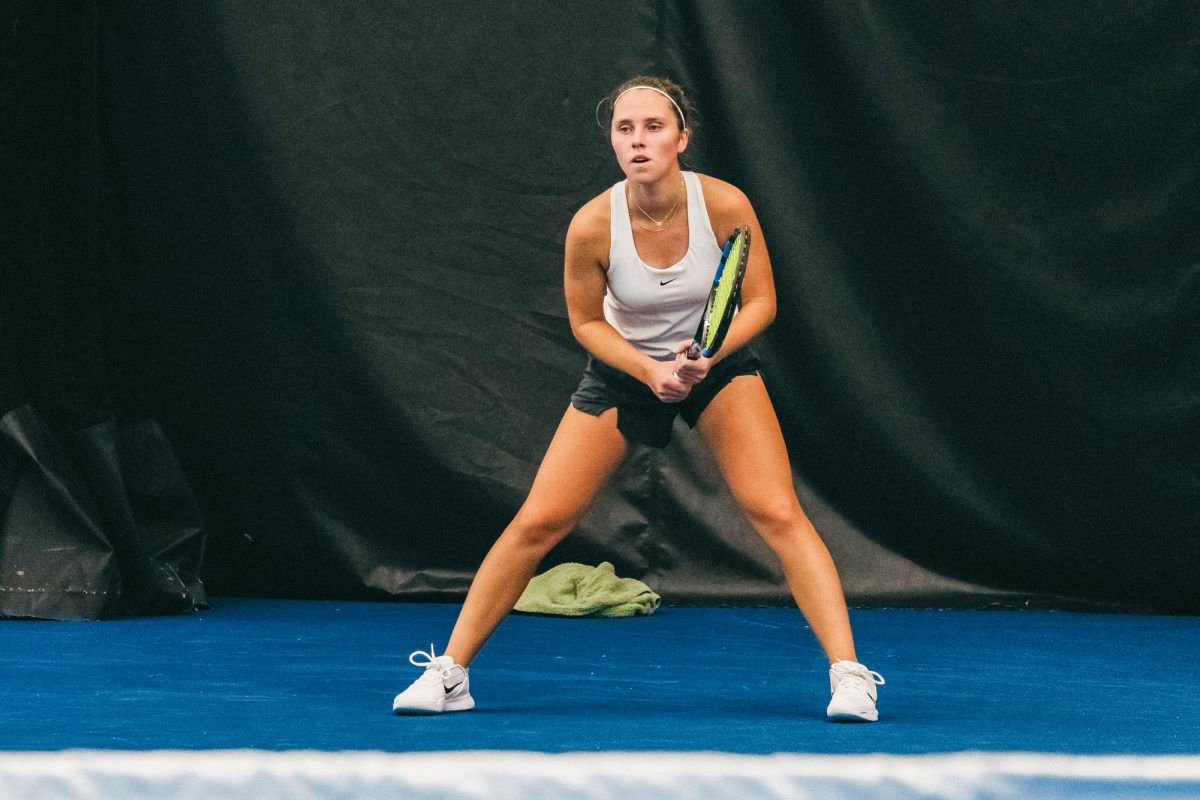Junior Kasia Treiber prepares to return the ball in her match against Sophomore McKenna Schaefbauer at Atkins Tennis Center on Nov. 7.