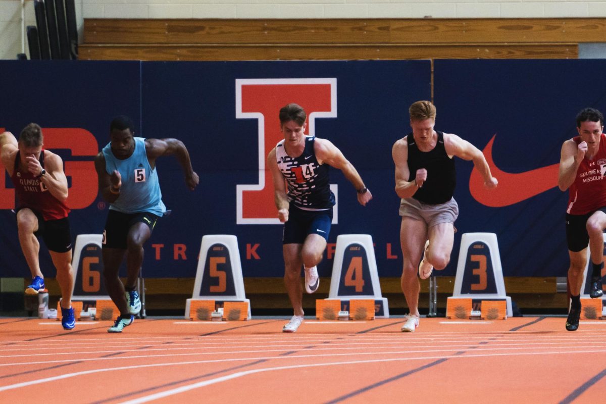 Senior Aiden Ouimet sprints towards the finish line on Dec. 1. Ouimet takes first and second respectively during the 60 meter dash.