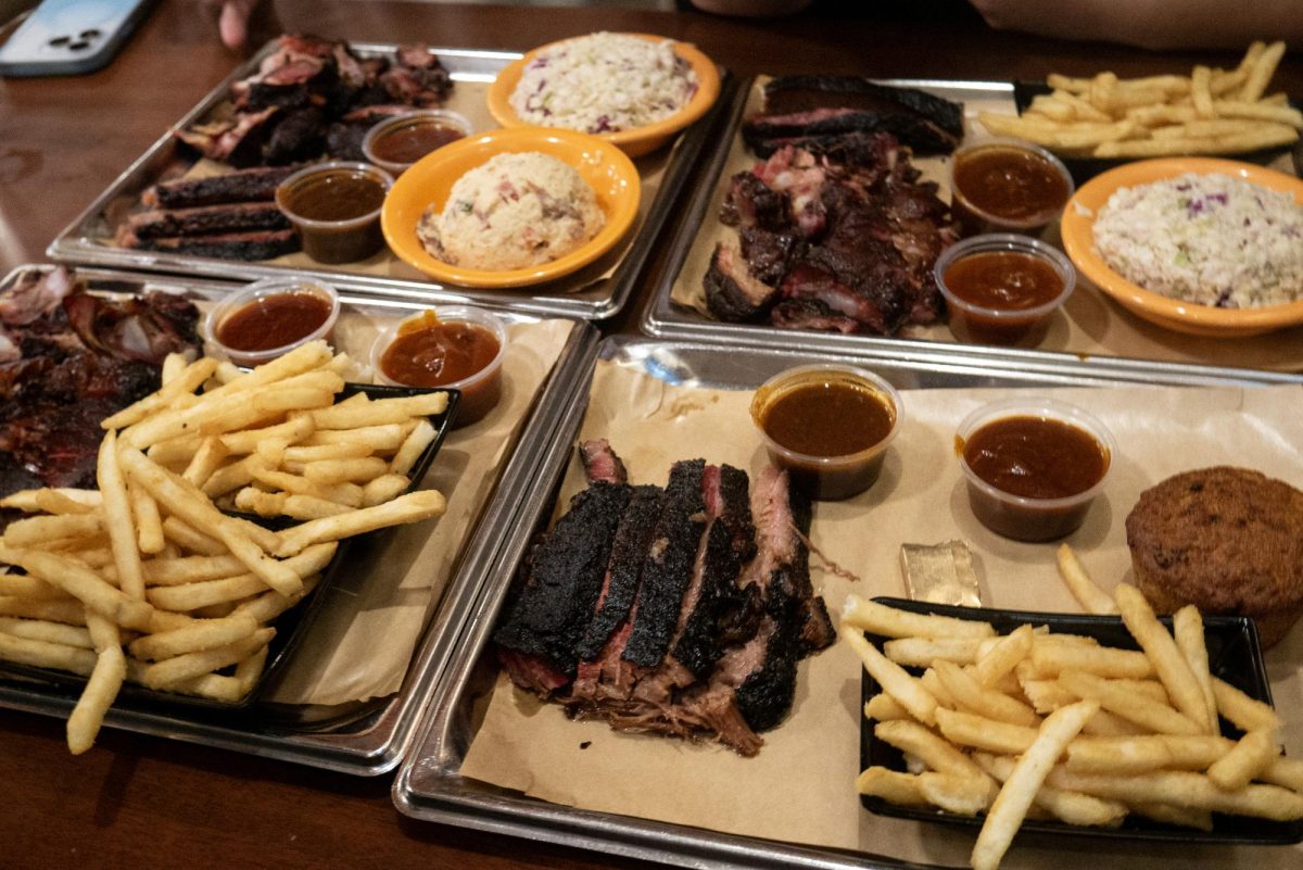 Four dishes of rib tips and burnt ends from Black Dog Smoke & Ale House on Feb. 9. The sokehouse is located on North Chestnut Street in Champaign.