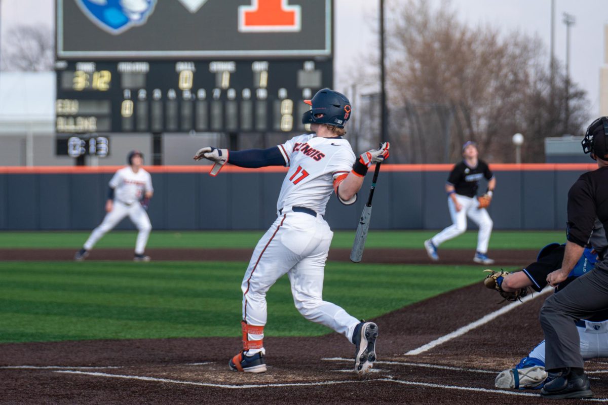 Junior Camden Janik swings big as Illinois look for a run in the bottom of the first inning against Eastern Illinois on Feb. 27.