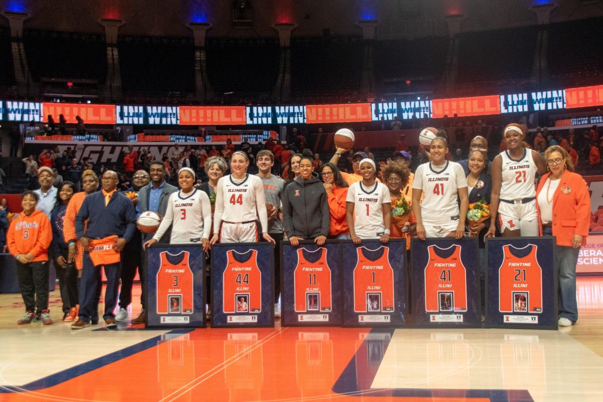 The entire team gathers after the Senior Day ceremony after the game against Nebraska on Mar. 3.