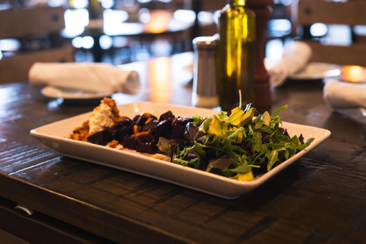 A+plate+of+honey+roasted+beet+and+arugula+from+Biaggis+Ristorante+Italiano+on+March+23.+The+restaurant+serves+as+a+perfect+spot+to+bring+your+mom+for+a+top-notch+dinner.