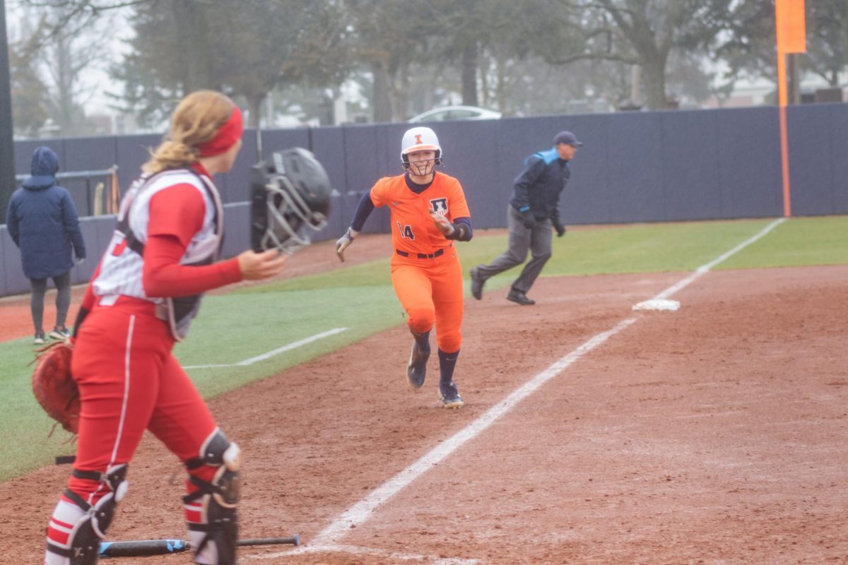 Graduate student outfielder Kelly Ryono runs for home against Rutgers on Mar. 24.