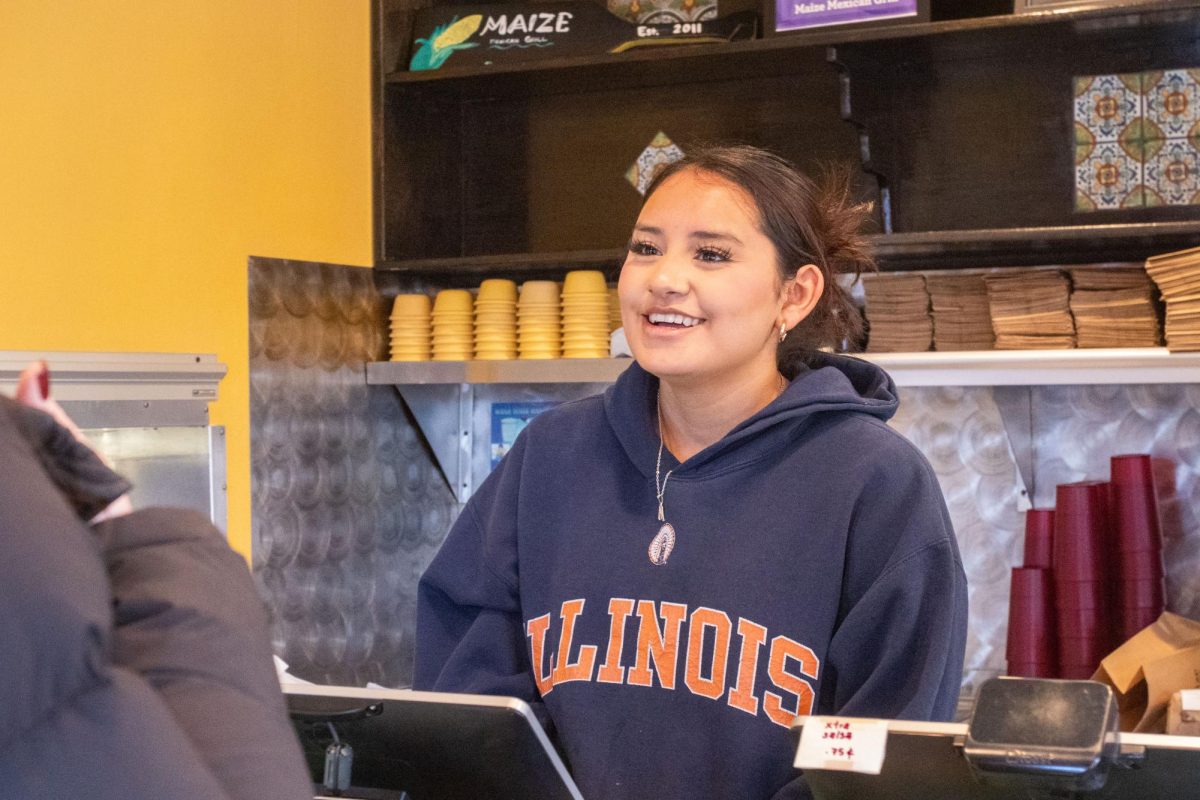 Senior in LAS Yoana Hernandez takes orders for customers at Maize Mexican Grill on March 2.
