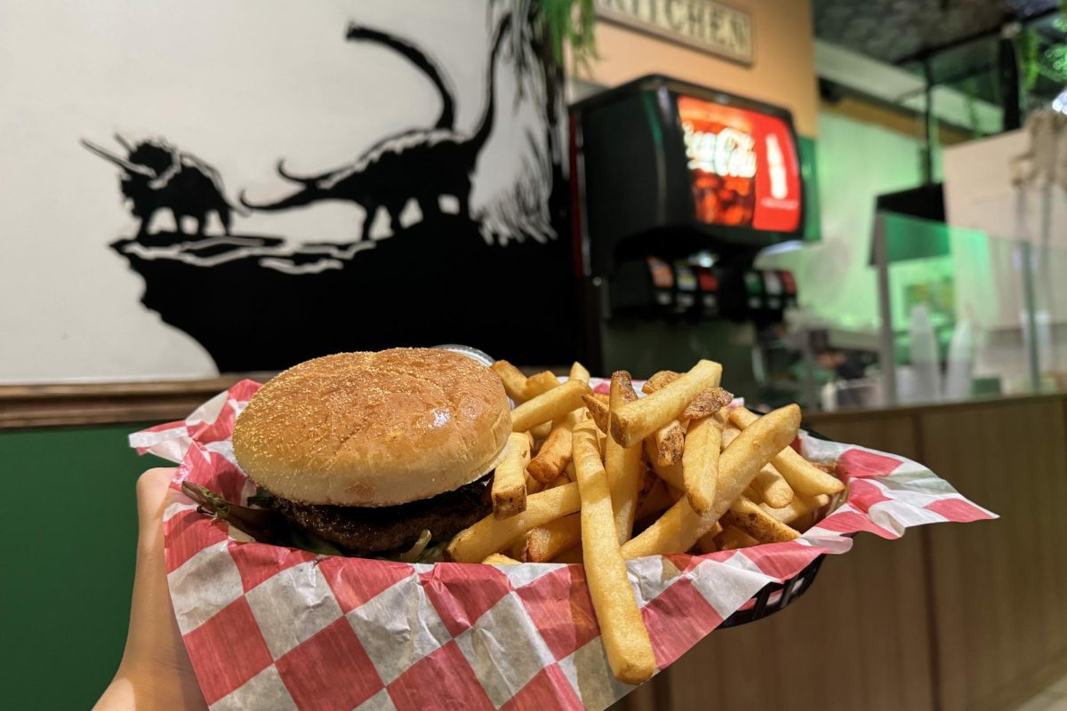 The T. rex burger with extra mushrooms from Jurassic Grill, a campus-favorite spot for late-night munchies and drunk eats, located accessibly on Green Street.