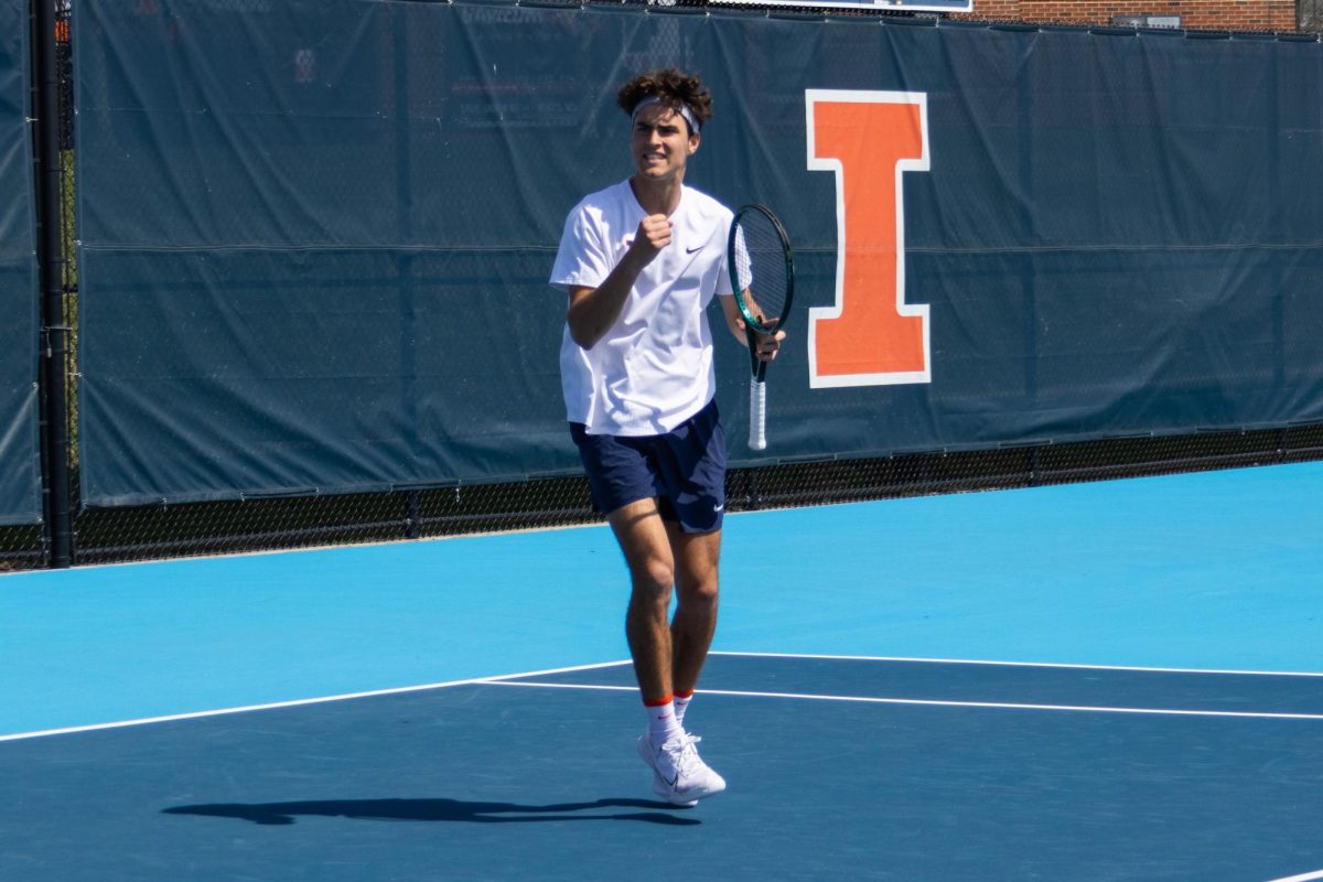 Junior Mathis Debru celebrates winning a game during a doubles match. Debru and Sophomore Kenta Miyoshi defeated Junior Will Cooksey and Freshman Alex Cairo 6-1 in doubles.