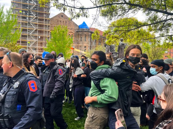 Students from the University gather to Alma Mater for an encampment protest on Friday morning, April 26. The protest was met with action from University Facilities & Services as well as UIPD leading to one arrest being made.