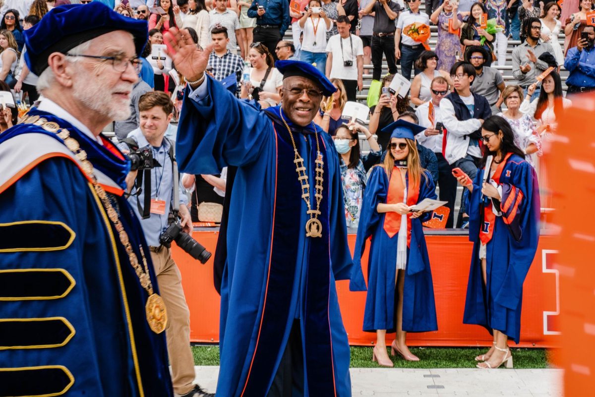 Chancellor waves to the graduating class of 2023 during graduation commencement on May 13, held at Memorial Stadium, as he makes his exit.