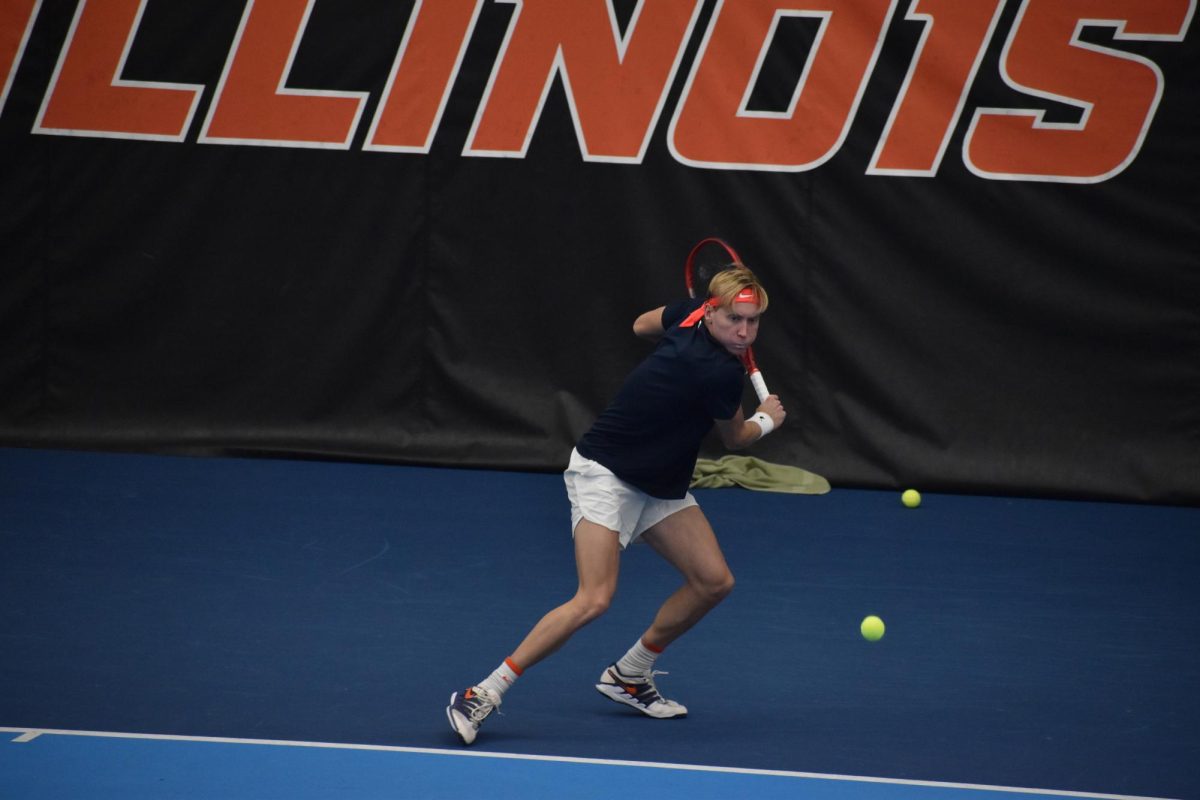 Junior William Mroz prepares to return a backhand against Ohio State University on March 6.