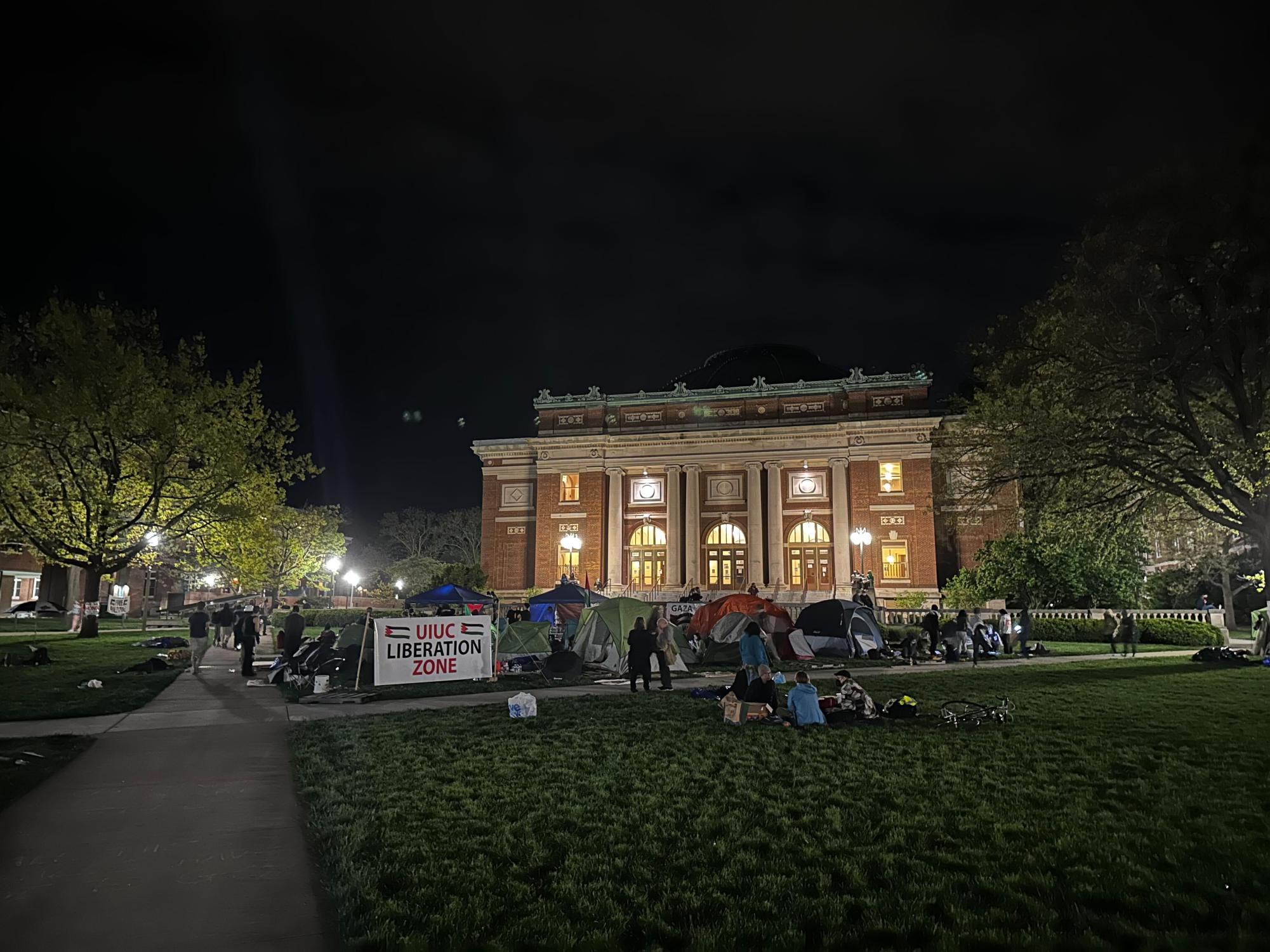 The encampment at around midnight on Sunday. Protesters remain on the Main Quad in tents and on the ground.
