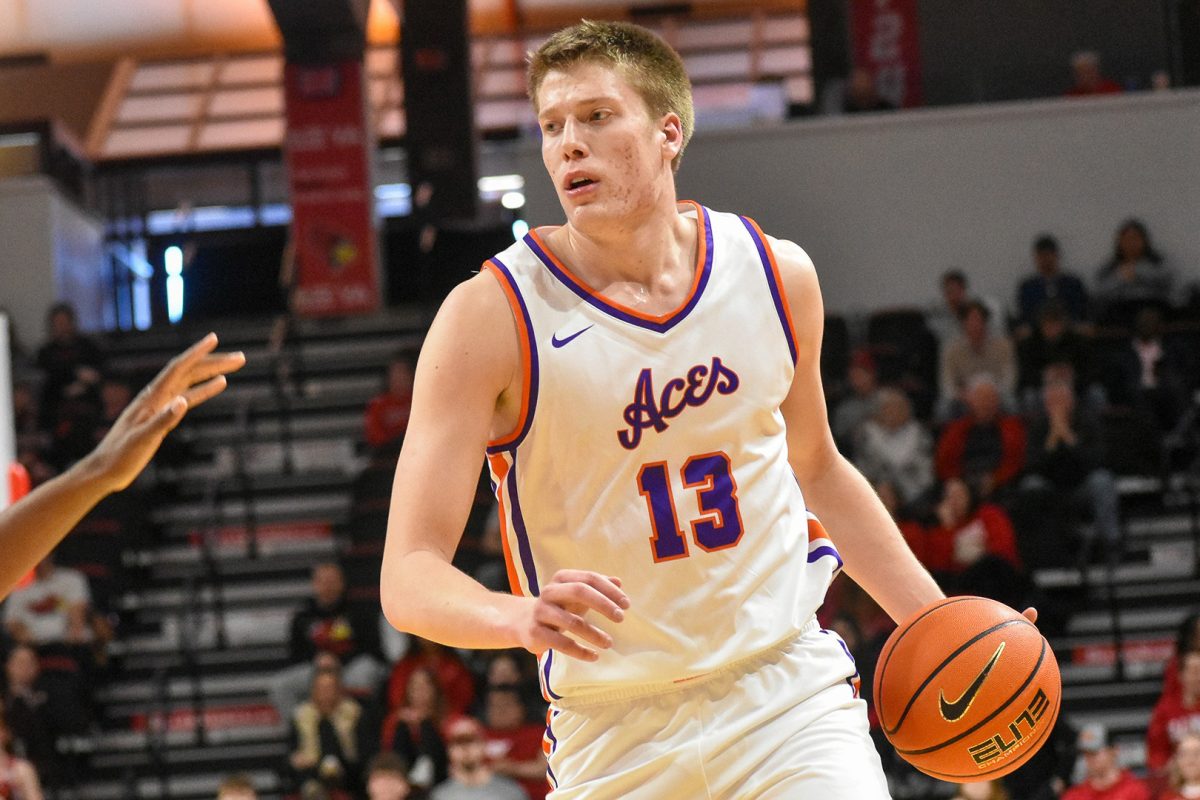 Senior Ben Humrichous holds the basketball for the University of Evansville Aces.