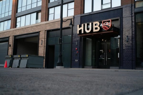 The Hub Champaign announced that a resident died on building property on Sunday morning. 