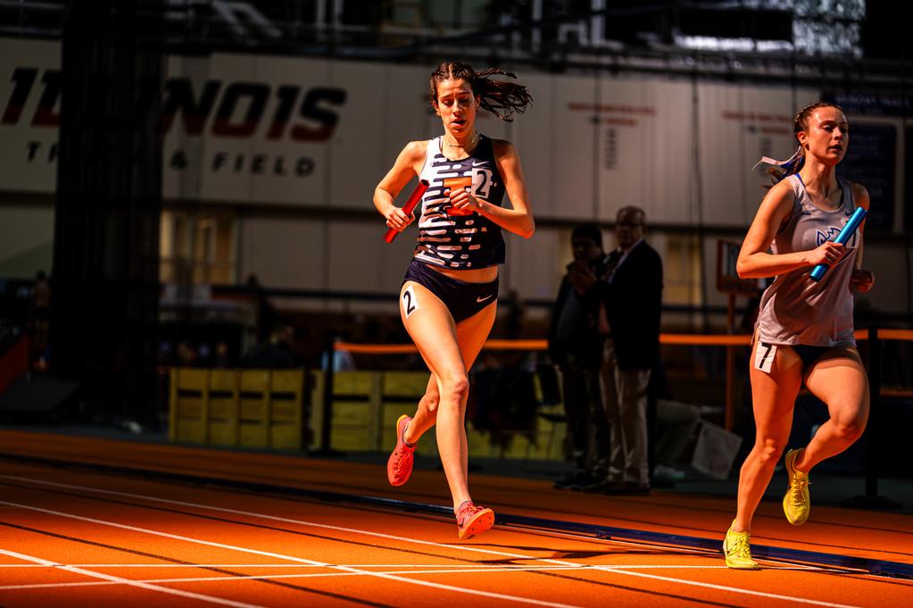 Illinois distance runner Maggie Gamboa runs a relay during the Illini Challenge at the Illinois Armory in Champaign on Jan. 26. 