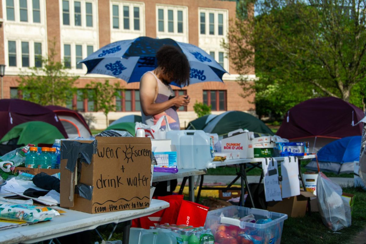 Tables set up in front of Foellinger Auditorium on May 1 with food and water for demonstrators.