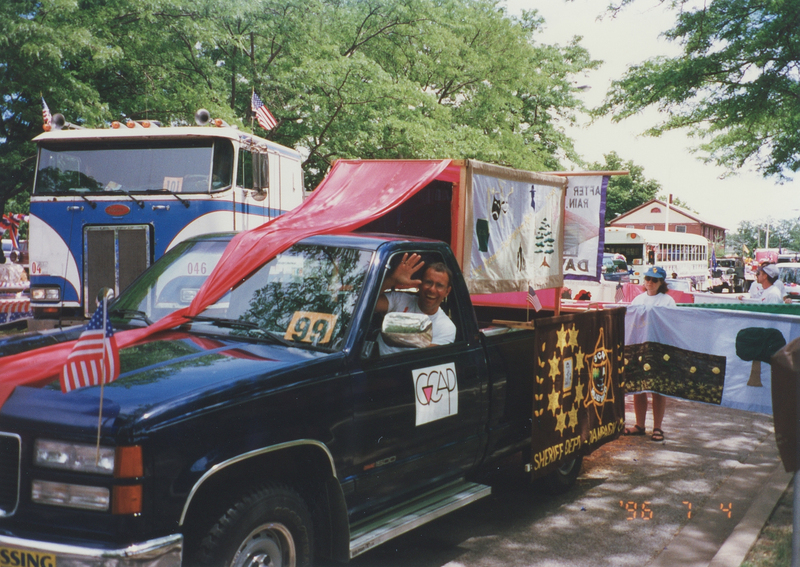 GCAP truck drives in a festival.