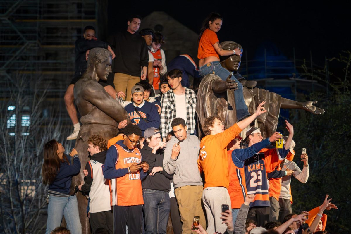 Following Illinois' win, massive crowds of orange and blue gathered at Alma Mater.