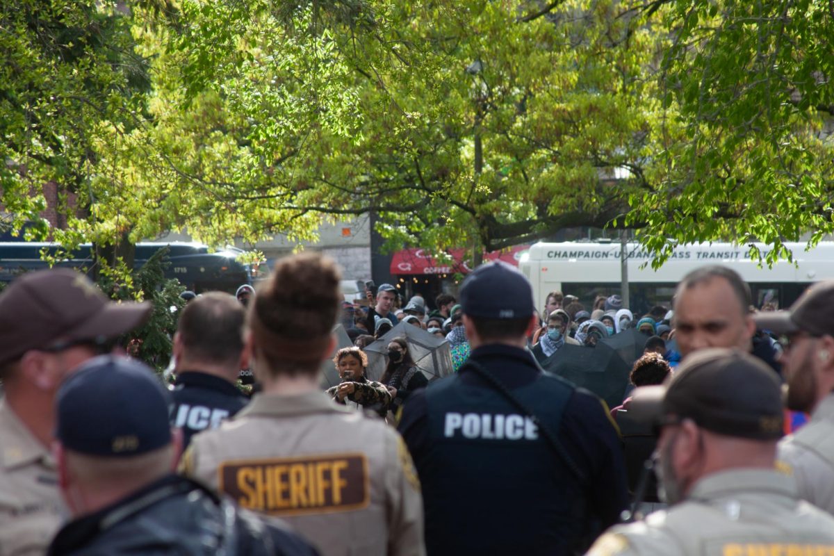 Local police officers from multiple departments during the pro-Palestine encampment demonstration at Alma Mater on April 26. 