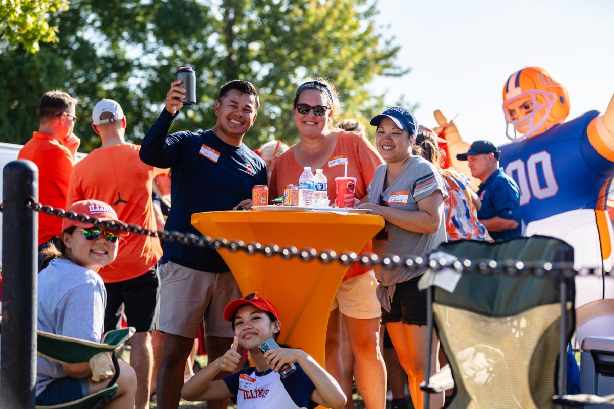 Illini Cheer family and friends tailgates prior to kickoff for the first game of the 2023 season where Illinois id set to go against Toledo on Sept. 2.