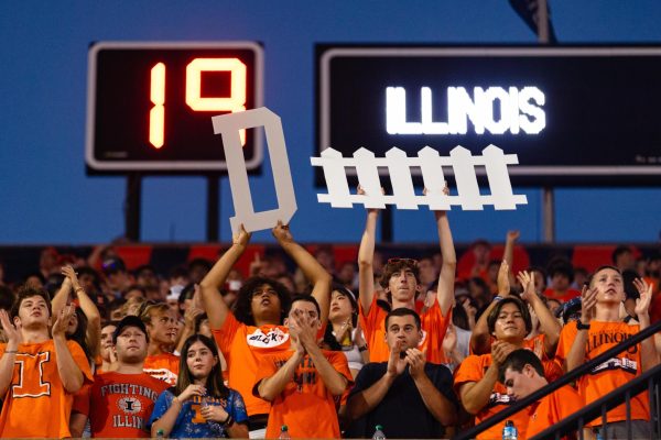 The Block I cheers on the Illini defense during the second quarter against Toledo on Sept. 2, 2023.