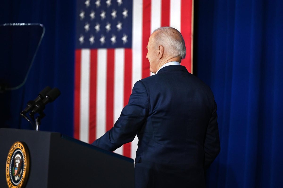 President Joe Biden speaks in Lost Creek, Ky., on Monday, Aug. 8, 2022, about the recovery efforts following flooding in Eastern Kentucky while surrounded by local, state and federal officials and also people whose homes were destroyed in the flooding.