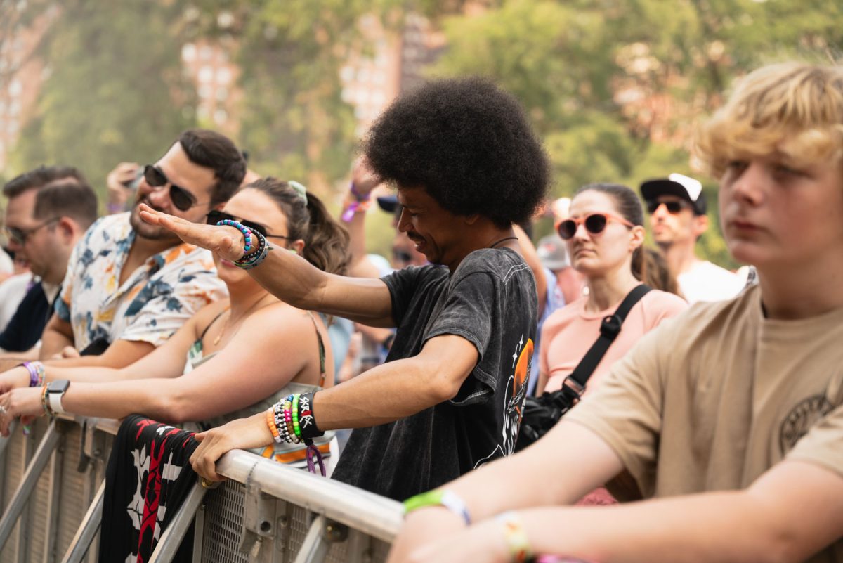 A festival goer bops their head as Skrillex’s set begins. 