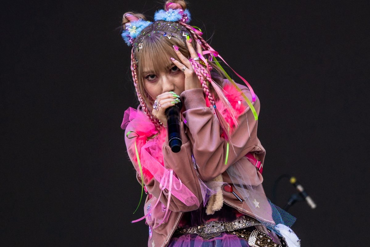 Yukina vocalizes is a harsh tone for the Jpop-rock concert.