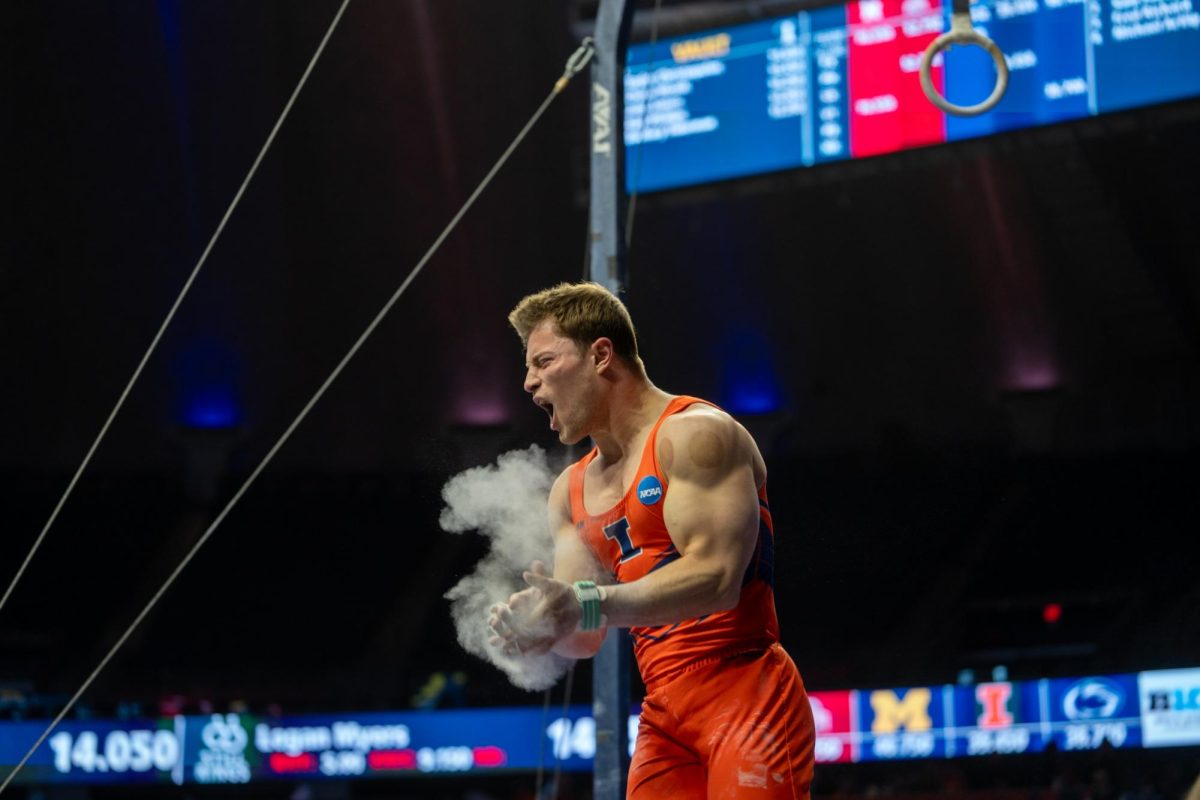 Ethan Boder scores 13.85 on the rings during the men's gymnastics Big Ten championship at the State Farm Center on April 5.