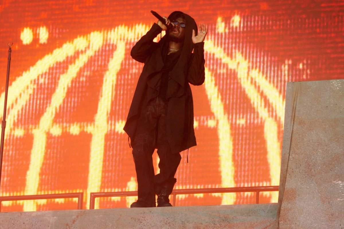 Standing on top of a brutalist structure, Labrinth’s music hits Lollapalooza festival goers’ ears at the T-Mobile stage on Aug. 1. 