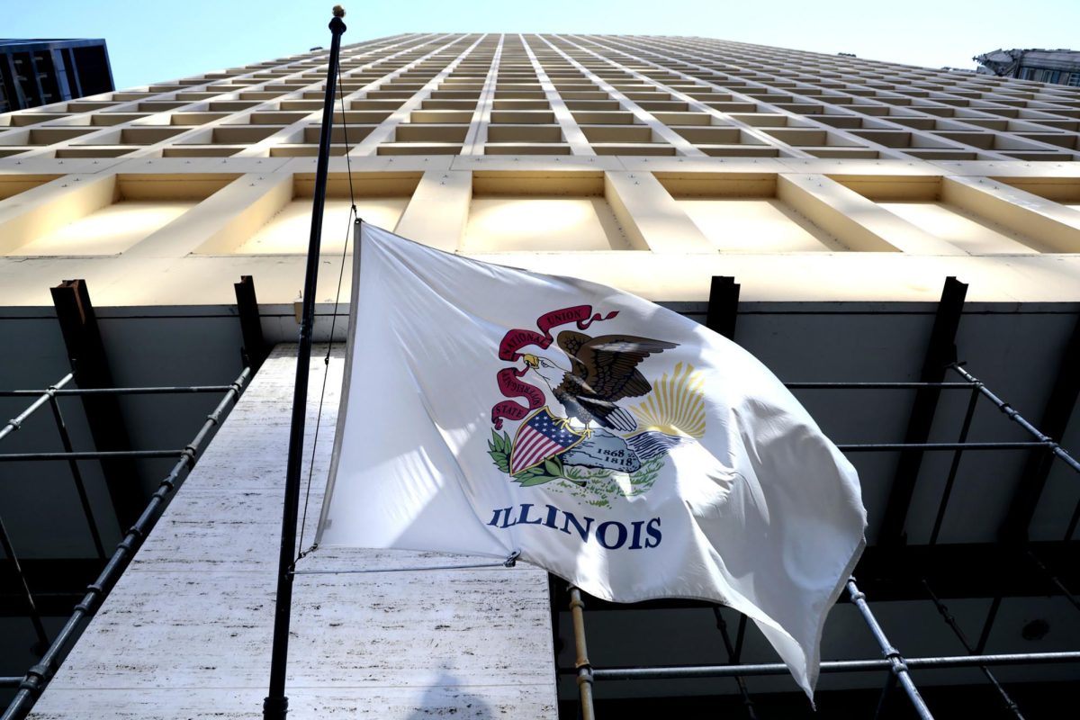 The state flag of Illinois at a Cook County building at 69 W. Washington, in Chicago, on March 7, 2023.