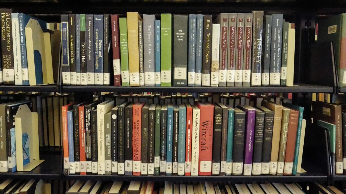 Books sit on a shelf in the University's Main Library on W Gregory Drive.