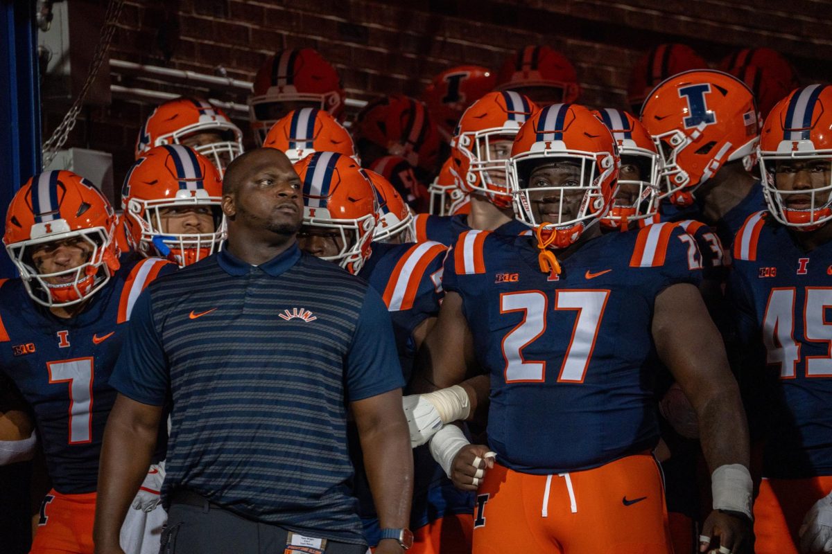 Assistant coach Archie McDaniel stands in front of the Illinois football team before the first game of the 2024 season. It is coach McDaniel's first season as an Illinois coach.