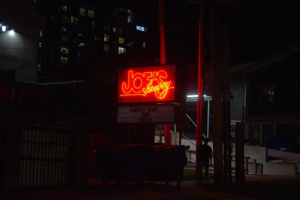 The Joe's Brewery sign shines through the dark night on Sunday. Joe's Brewery sits on S 5th Street in between E Green Street and E John Street.