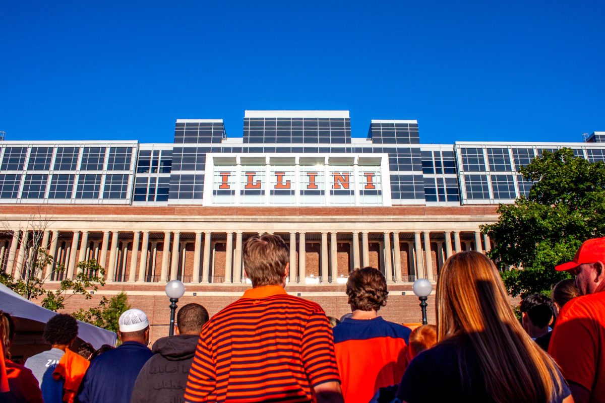 A crowd of Fighting Illini fans making their way into Memorial Stadium before the game vs Kansas on Saturday.  