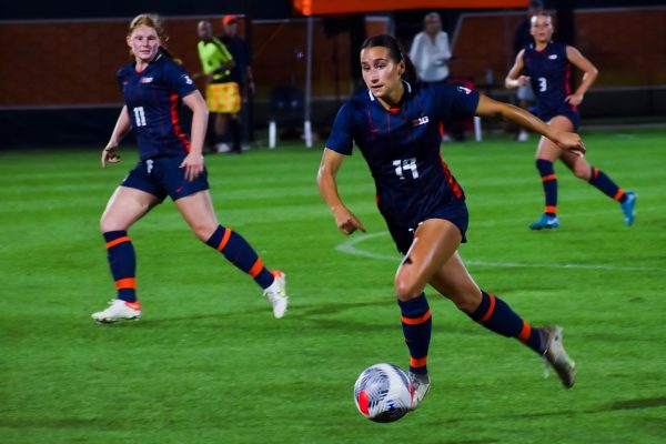 Senior defender Angie Galo chases after the ball to stop Minnesota's attack.