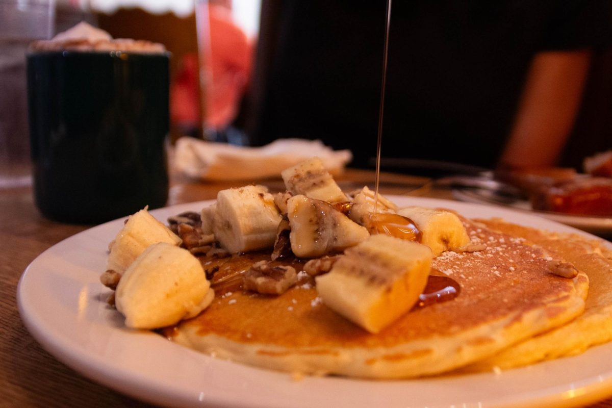 The Courier Cafe's banana walnut pancakes and hot chocolate. This historic fixture of downtown Urbana serves breakfast all day.